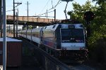 Outbound commuter shoves out of the station